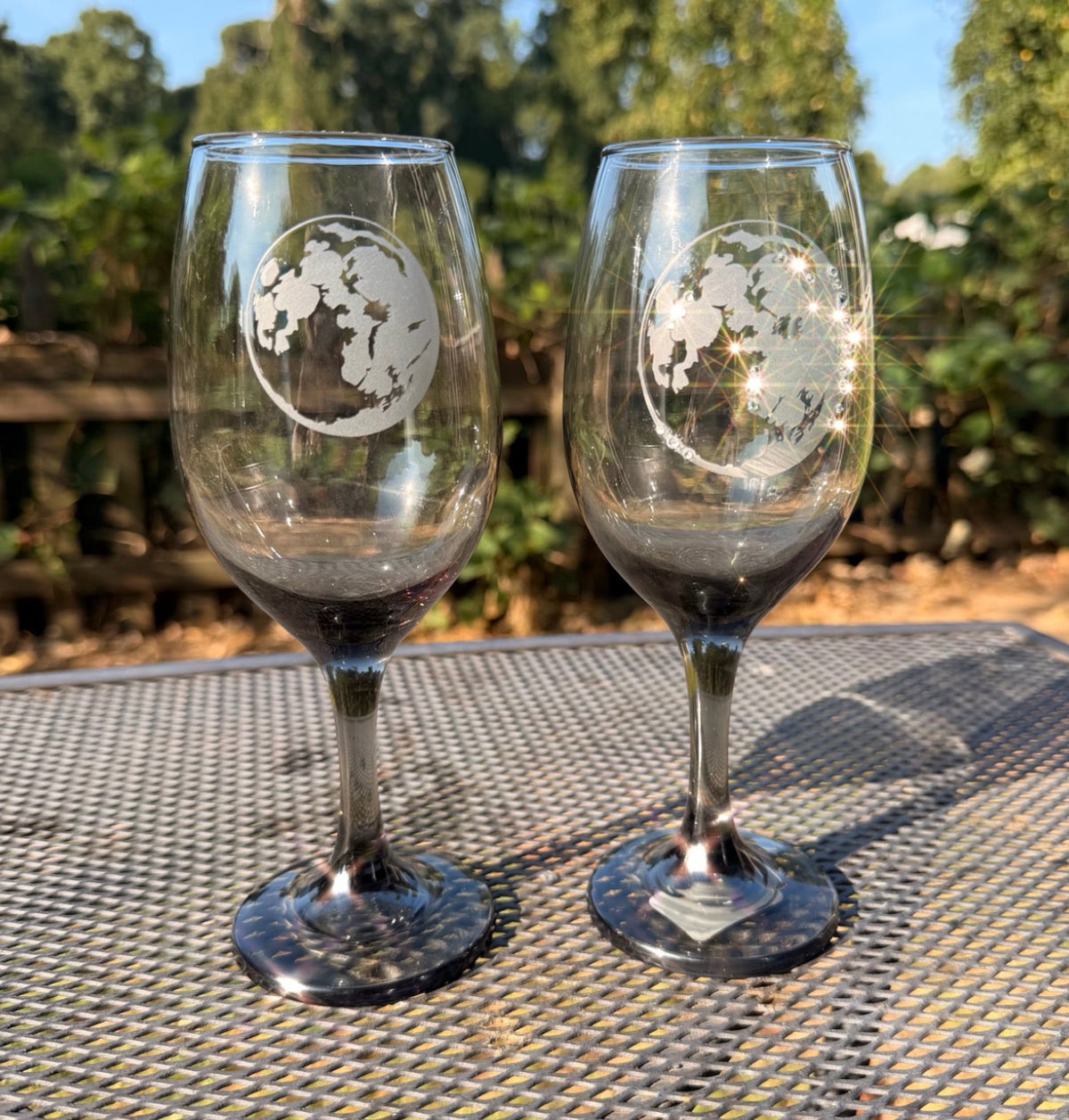 Full Moon hand-etched wine glasses side by side