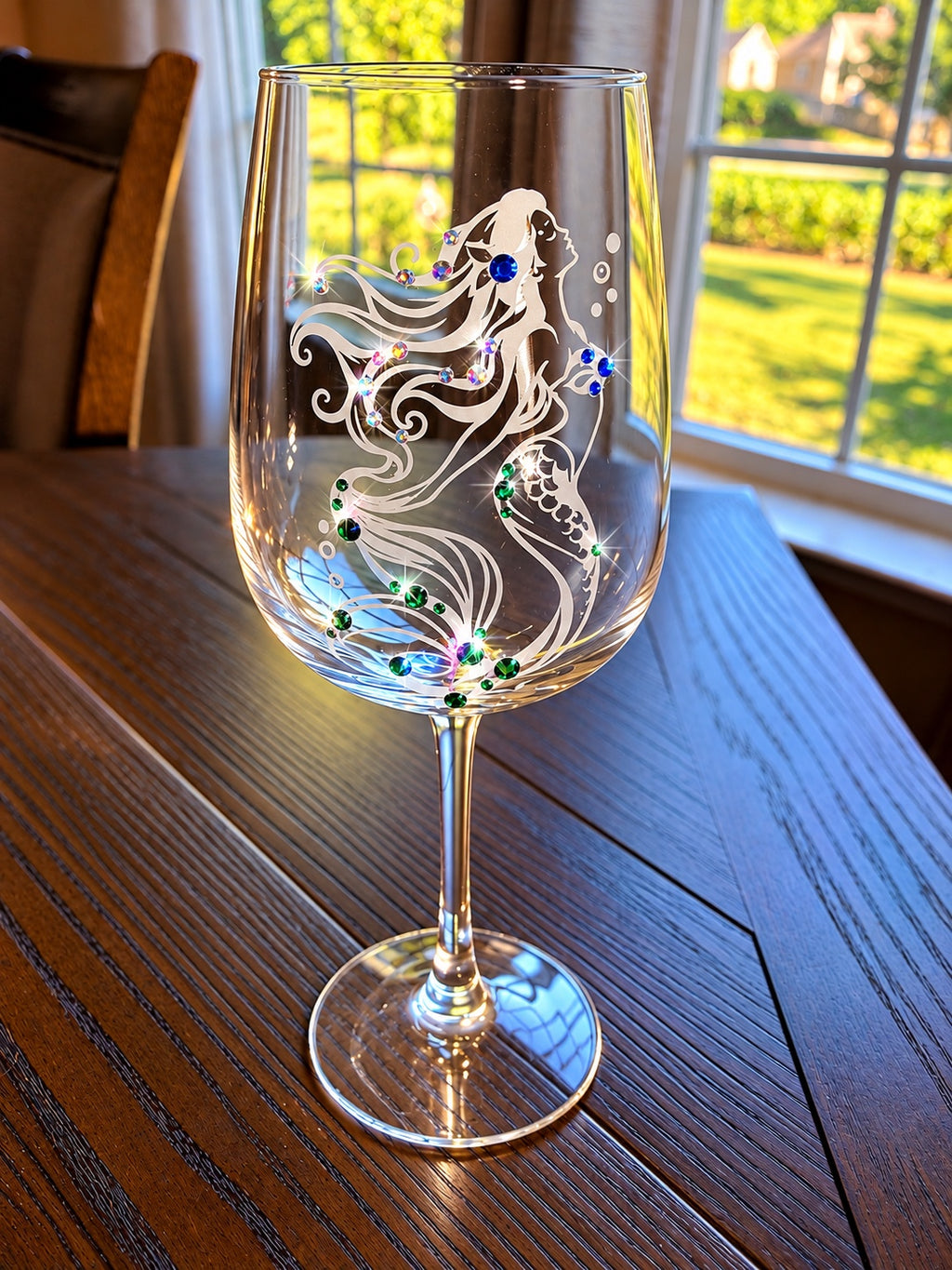 Mermaid 2 hand-etched wine glass with Swarovski crystals indoors